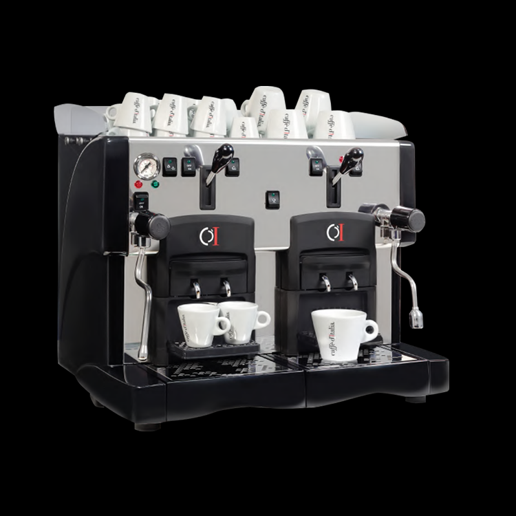 Imagen de la cafetera elleta con tazas sobre la maquina